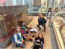 Children sitting on floor in British Museum