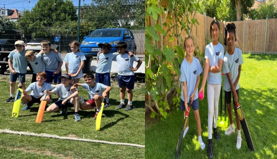 Girls and boys standing with cricket bats for a photo