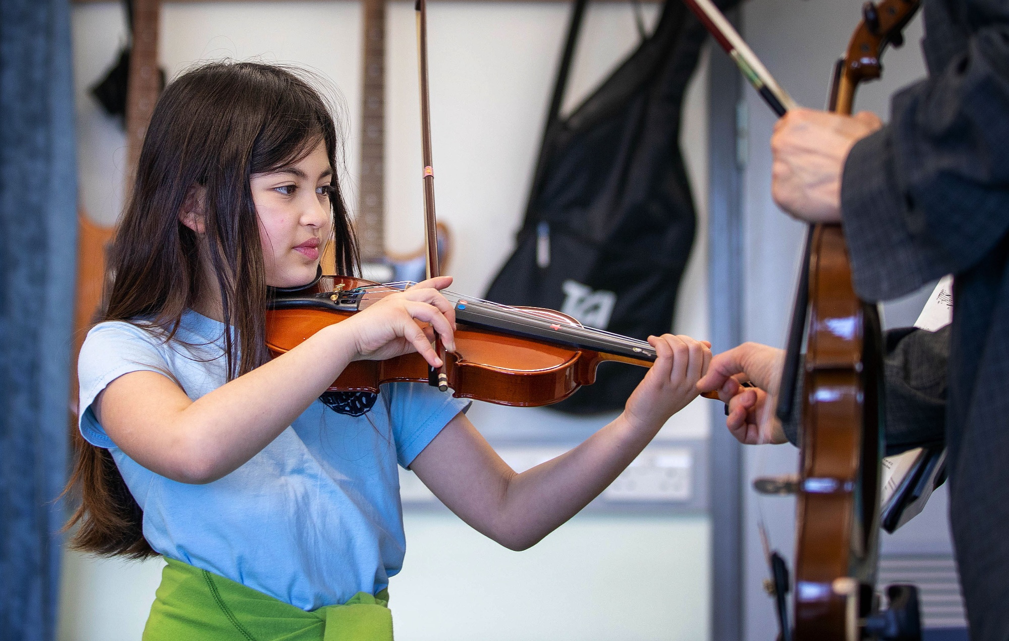 Pupil playing the violin