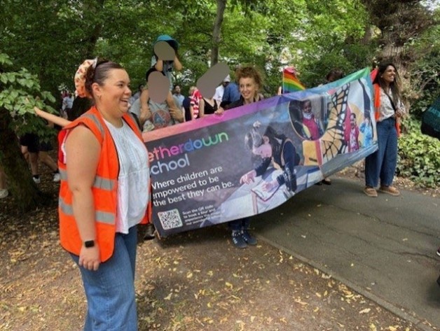 People holding a banner